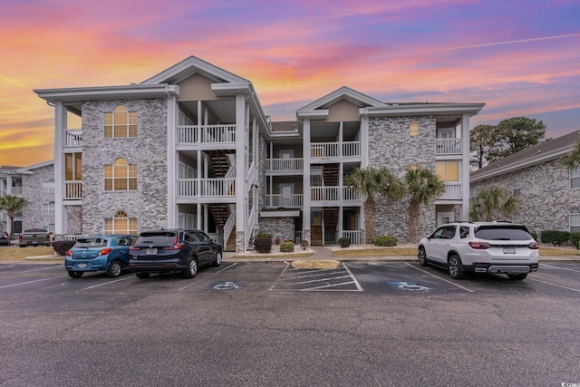 view of outdoor building at dusk