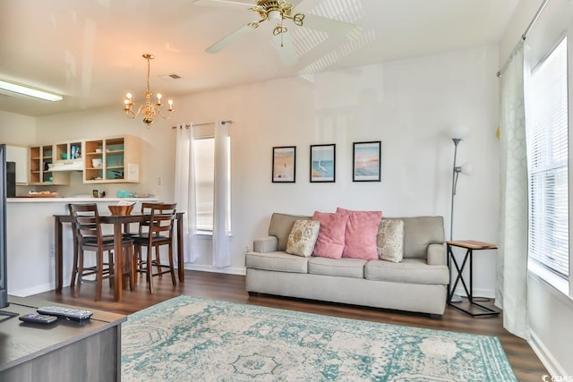 1302 River Oaks Dr Unit 4-F, Myrtle Beach, SC 29579 - living area with dark wood-style floors, ceiling fan, and a chandelier