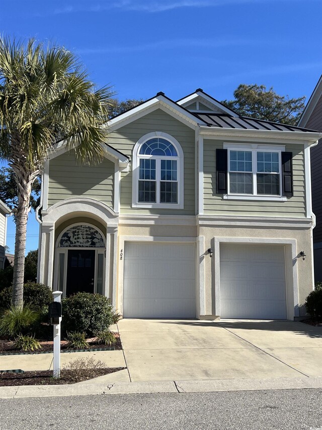 view of property featuring a garage