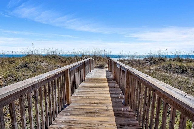 surrounding community featuring a water view