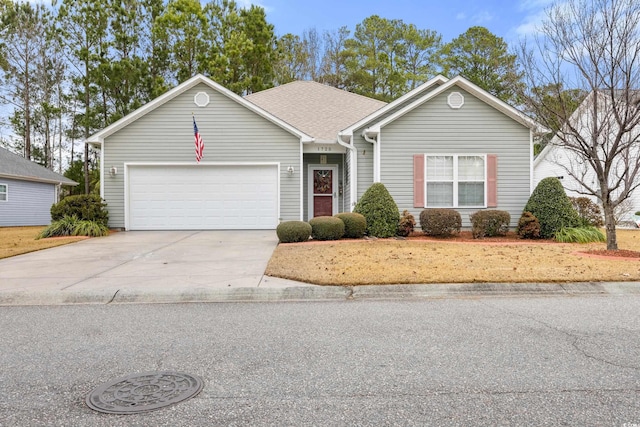 single story home featuring a garage