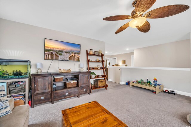104 Grace Bay Ct, Pawleys Island, SC 29585 - carpeted living room with a ceiling fan and baseboards