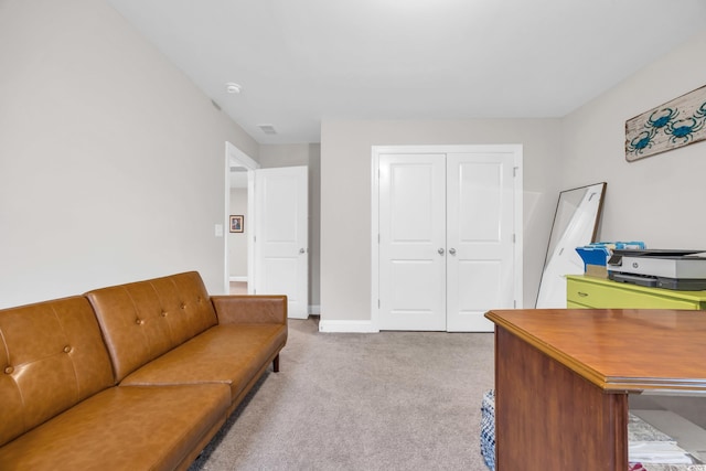 office featuring baseboards, visible vents, and carpet floors