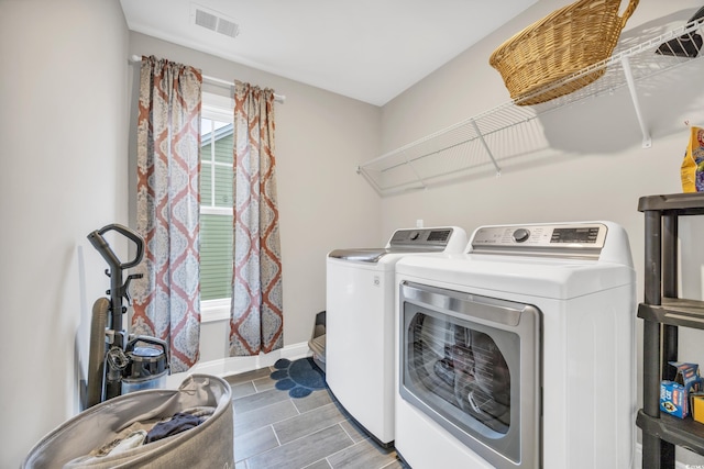 laundry room with washer and clothes dryer