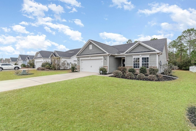 view of front of home featuring a garage and a front yard