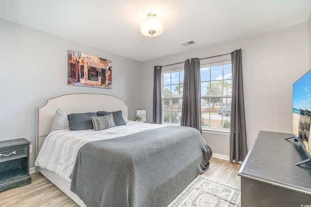 bedroom featuring light hardwood / wood-style floors