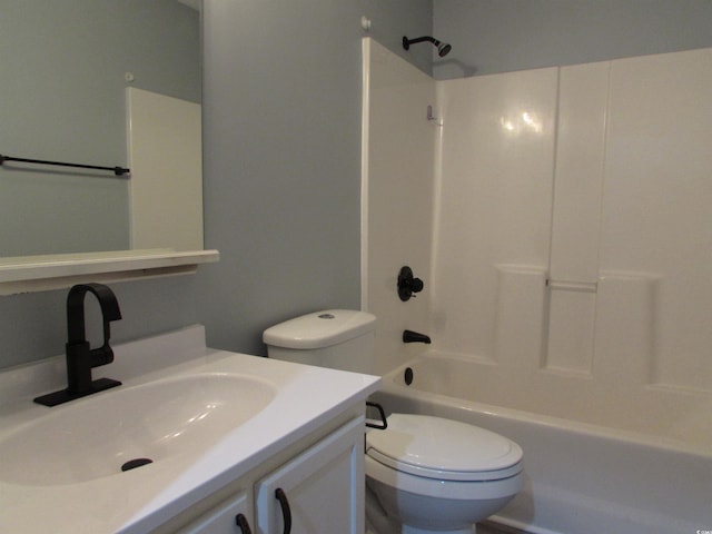 full bathroom with vanity, shower / tub combination, and toilet