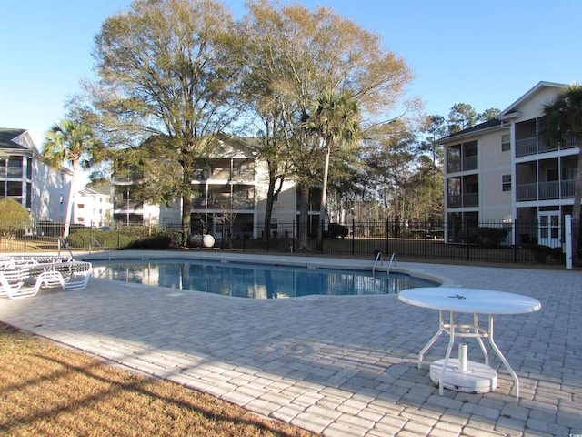 view of pool with a patio