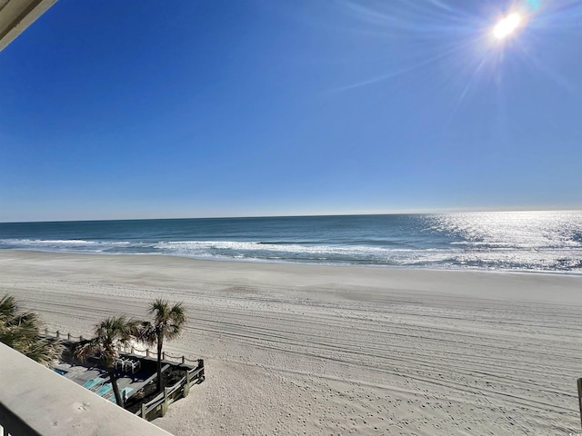 property view of water featuring a beach view