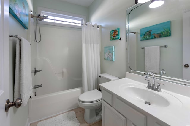 full bathroom with toilet, vanity, tile patterned floors, and shower / bath combo