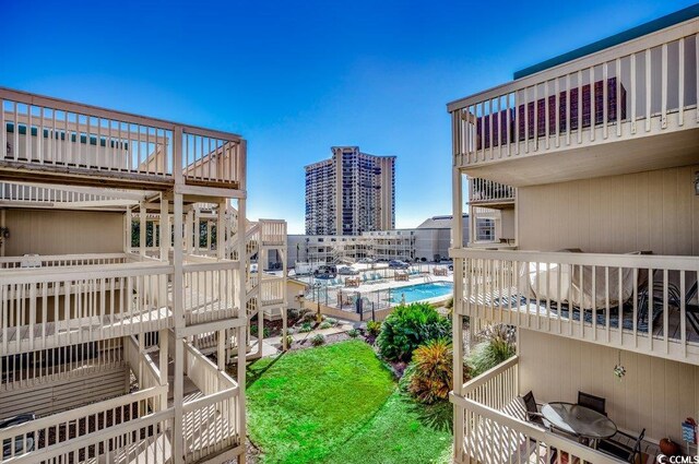 view of property's community featuring a swimming pool