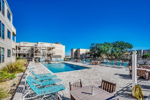 view of pool with a patio