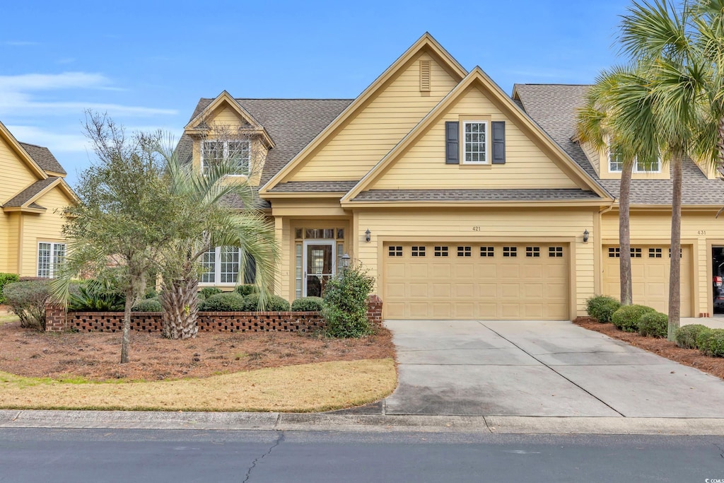 view of front of property featuring a garage