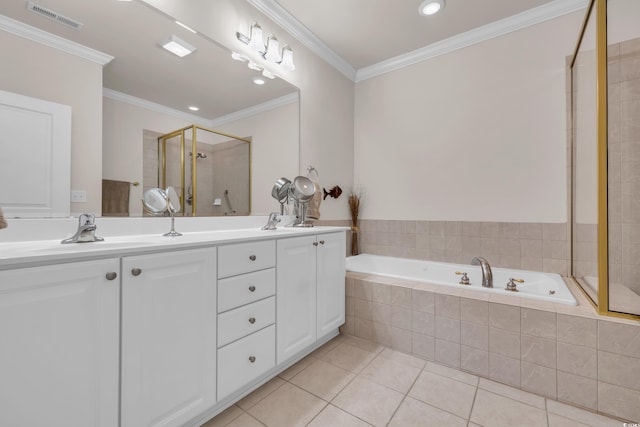 bathroom with tile patterned flooring, ornamental molding, independent shower and bath, and vanity