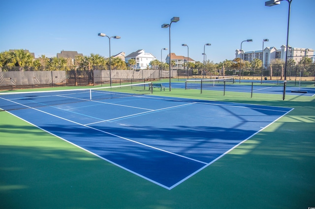 view of tennis court with basketball court