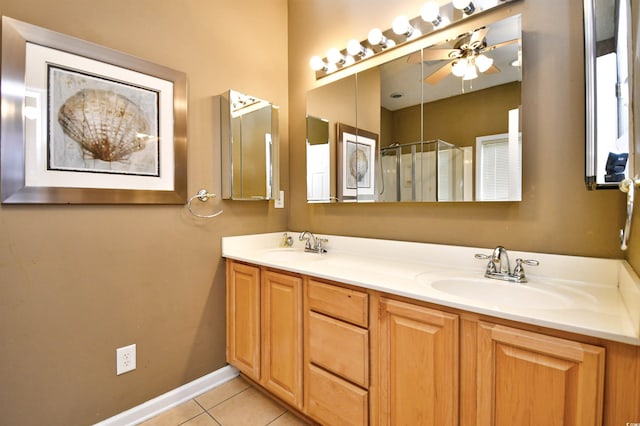 bathroom featuring an enclosed shower, ceiling fan, tile patterned floors, and vanity