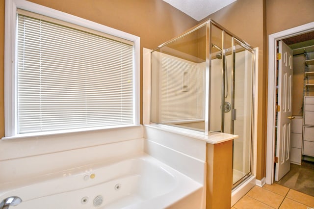 bathroom featuring shower with separate bathtub and tile patterned floors