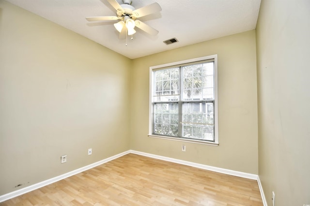 unfurnished room featuring ceiling fan and light hardwood / wood-style flooring