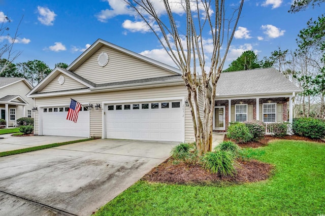 view of front facade featuring a front lawn and a garage