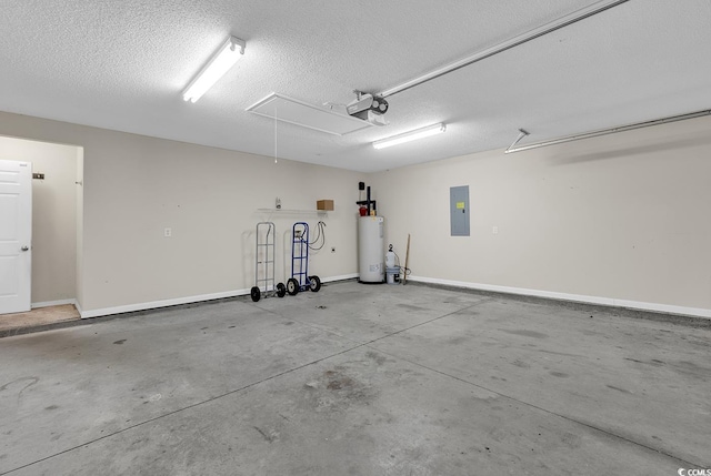 garage with water heater, a garage door opener, and electric panel