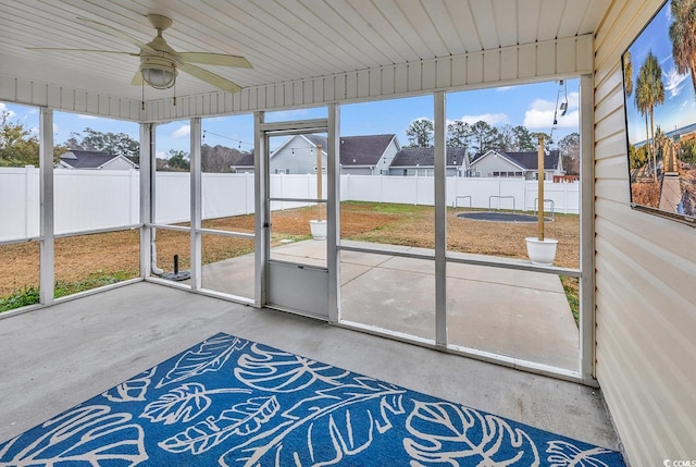 unfurnished sunroom with plenty of natural light