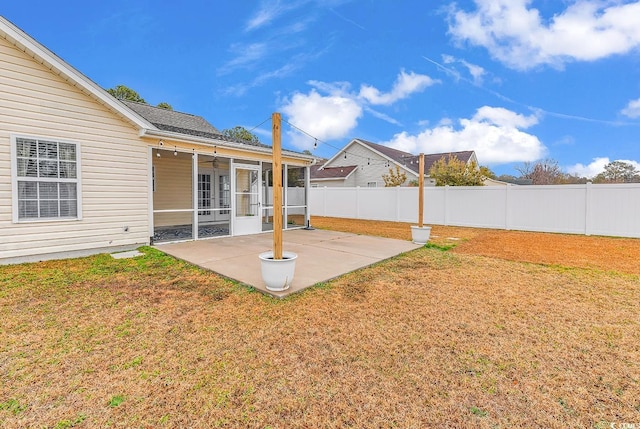 view of yard with a patio and a sunroom