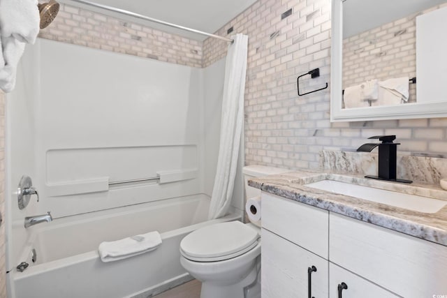 full bathroom featuring toilet, vanity, shower / tub combo with curtain, and brick wall