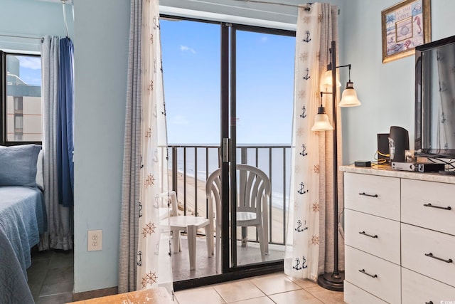 bedroom featuring light tile patterned floors