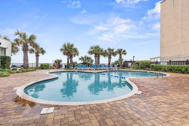 view of pool featuring a patio