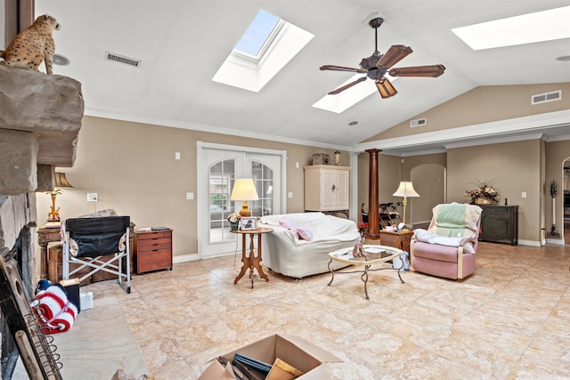 living room featuring ceiling fan, ornamental molding, and vaulted ceiling