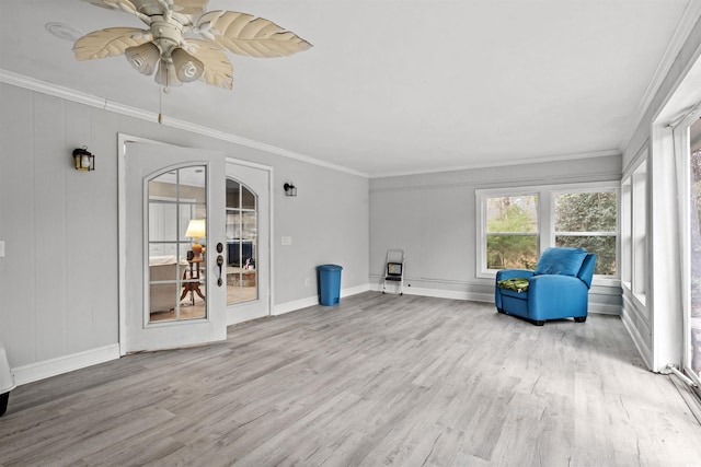 interior space featuring ceiling fan and french doors