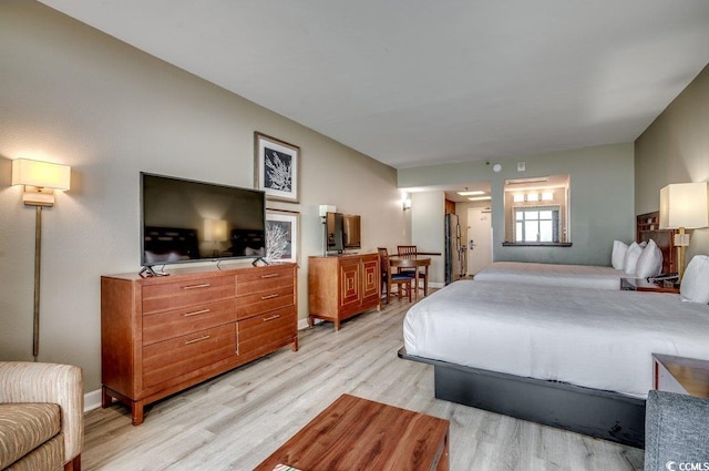 bedroom featuring light wood-type flooring