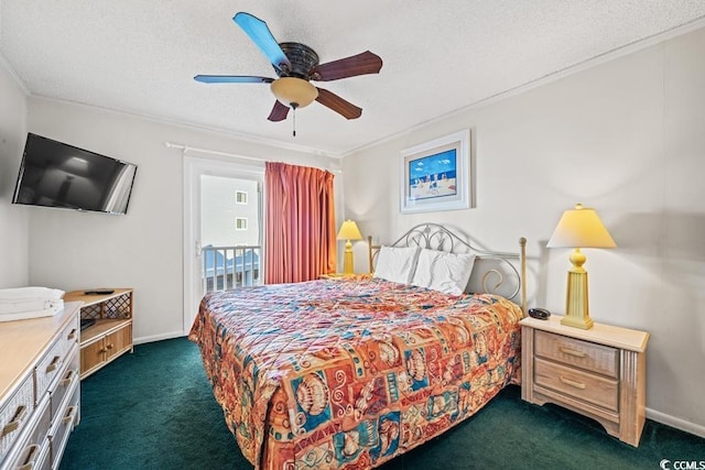 bedroom with ornamental molding, a textured ceiling, dark colored carpet, and ceiling fan