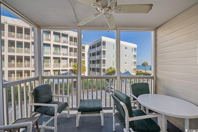 balcony featuring ceiling fan