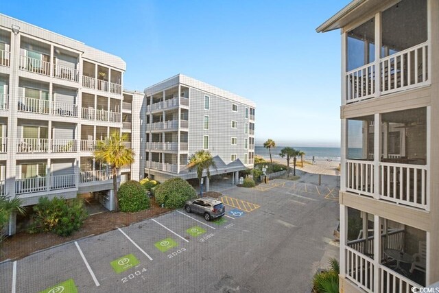 view of property with a water view