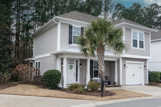 view of front of property with a garage