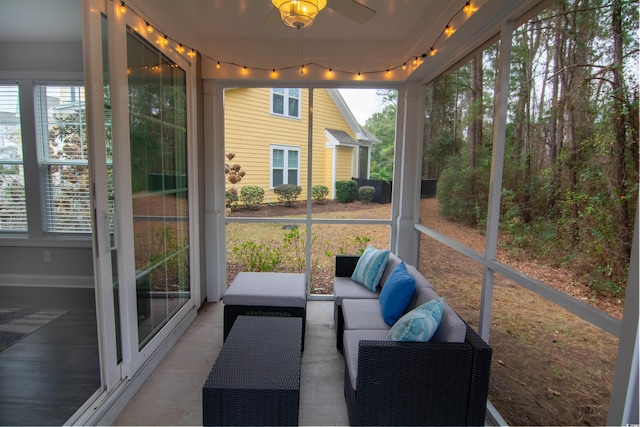 sunroom / solarium with ceiling fan and plenty of natural light