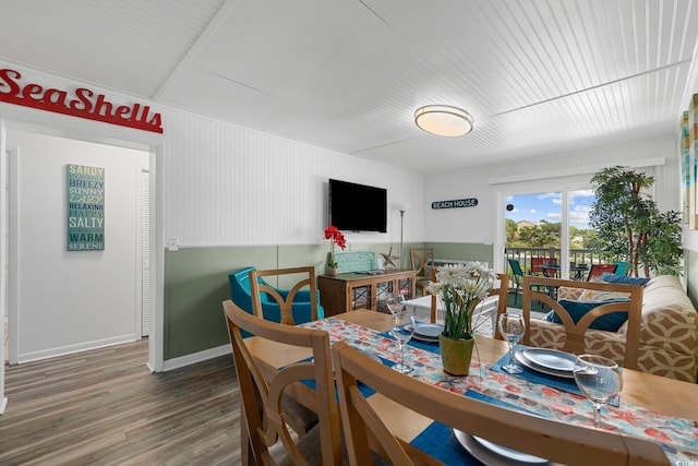 dining space featuring hardwood / wood-style floors