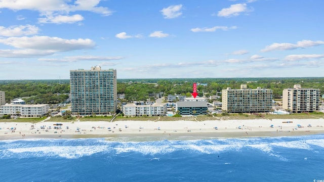 drone / aerial view with a view of the beach and a water view