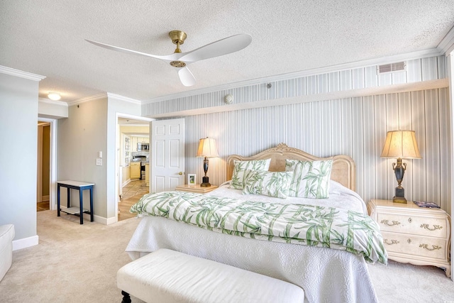 carpeted bedroom featuring a textured ceiling, ceiling fan, and ornamental molding