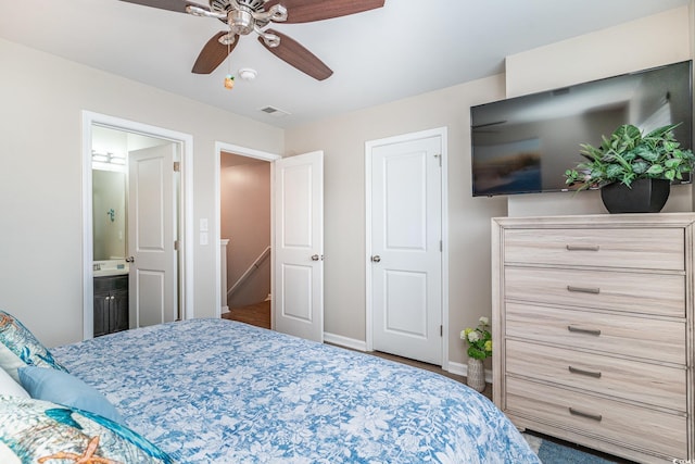 bedroom with connected bathroom and ceiling fan