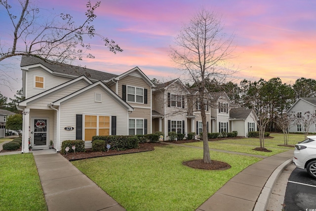 view of front of home with a yard