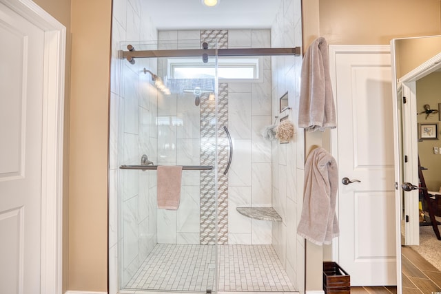 bathroom with an enclosed shower