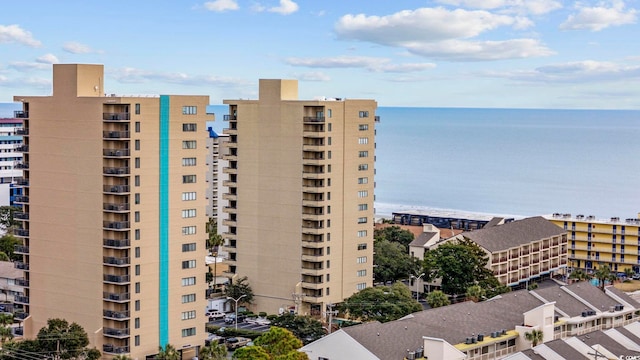 view of building exterior featuring a water view