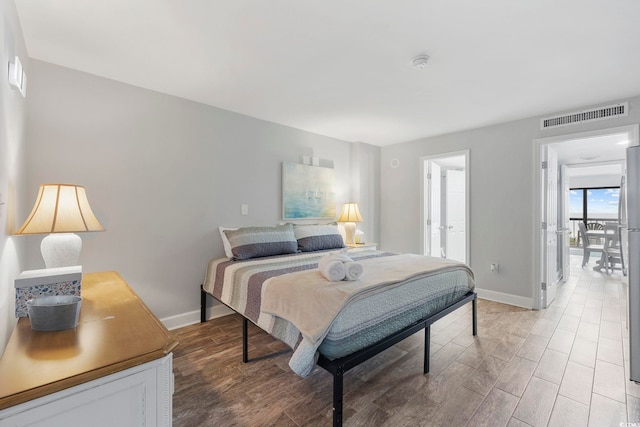 bedroom featuring hardwood / wood-style flooring