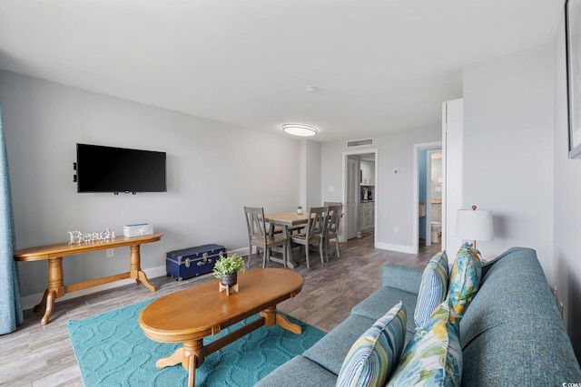 living room with hardwood / wood-style flooring