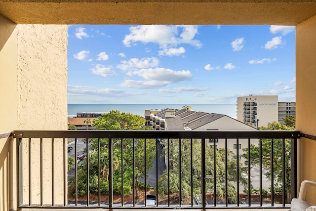 balcony featuring a water view