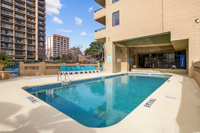 view of pool featuring a patio