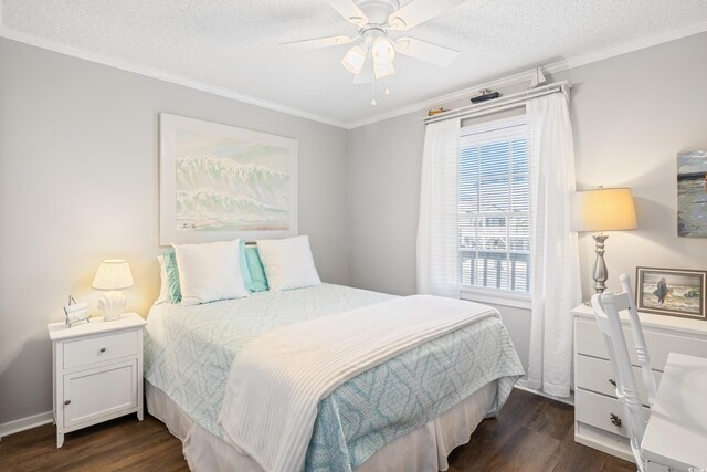 bedroom featuring ornamental molding, a textured ceiling, ceiling fan, and dark hardwood / wood-style floors