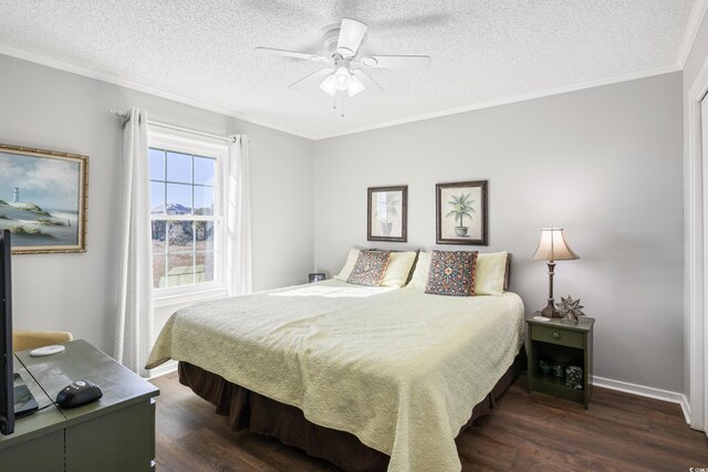 bedroom featuring dark hardwood / wood-style flooring, a textured ceiling, ceiling fan, and ornamental molding